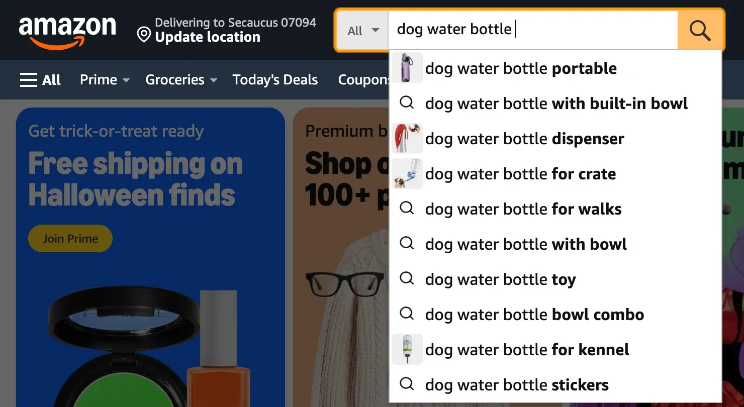 Amazon.com search bar autocomplete for dog water bottle, suggesting portable, with built-in bowl, dispenser, for crate, for walks, with bowl, toy, bowl combo, for kennel and stickers, with no search volume shown